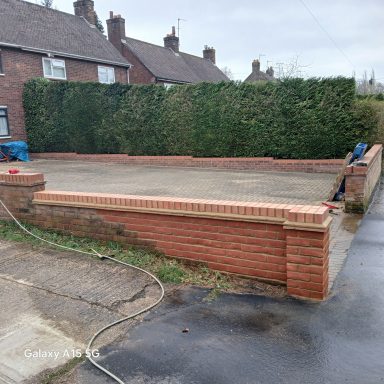 Large garden wall construction in Flitwick