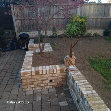 Hitchin retaining wall brickwork construction Cream brick retaining garden wall construction in Hitchin